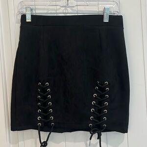 Black faux suede zippered lace up tie front skirt 15” sexy! Size medium NWOT